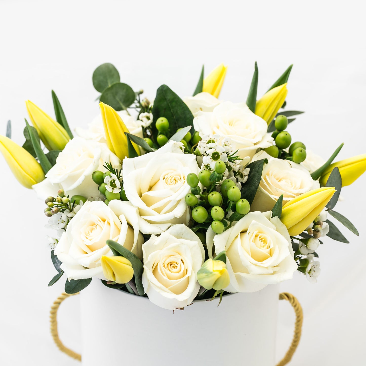 Flower box roses and tulips